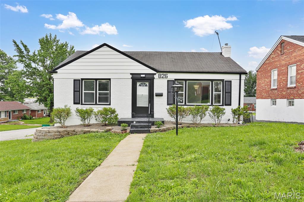 Newly painted four-sided brick home on corner lot with 3 bedrooms, 2 custom luxury baths, custom tiled fireplaces, finished basement, attached garage, stainless steel appliances, smart features, updated landscaping and more. Every detail shows with this custom design. Book a showing today. This home will not last!