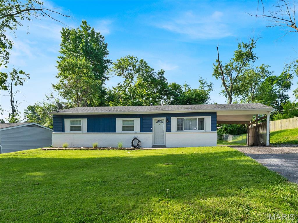 This three bed, one bath charmer is ready for it's next homeowners to love it like its current owners have! Step inside to an open family room to kitchen concept, with a spacious, bright family room for relaxing and recharging, yet open to the kitchen- separated by a breakfast bar which adds extra counter space and seating!  The eat-in kitchen equips you with all the amenities- Range, dishwasher, and built in microwave! Proceed down the hallway, and as you pass a nicely appointed hall bathroom, AND laundry space with a stackable washer/dryer, you'll find three bedrooms with vinyl flooring and lighted ceiling fans.  The home has a carport, and an expansive backyard with plenty of patio for grilling, entertaining, and general R & R!  Served by great schools, public and private, with parks nearby, and all the shops and restaurants that Manchester Road has to offer!  Ballwin has a public golf course, and The Pointe at Ballwin Commons which is available to residents at a discount.
