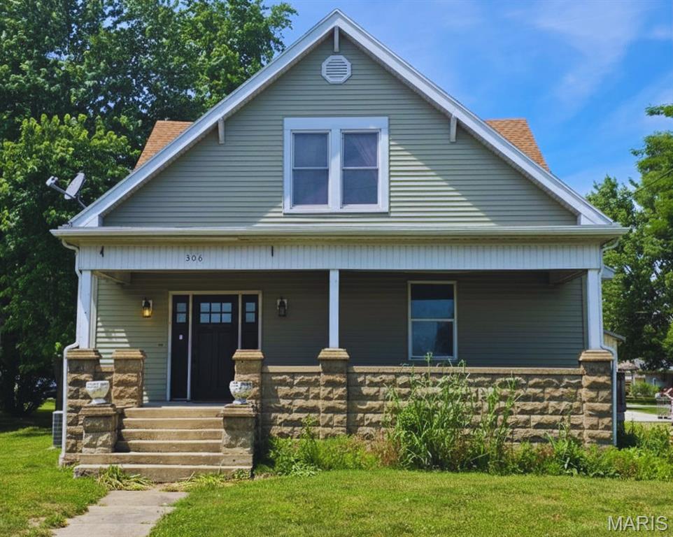 Step into timeless charm and modern convenience with this beautiful 4-bedroom, 2-bath Craftsman-style home loaded with character and distinctive architectural details. From the moment you arrive, you'll appreciate the warmth, craftsmanship, and curb appeal that make this property truly special. Inside, spacious living areas are filled with natural light and showcase the original charm that Craftsman homes are known for. Thoughtfully designed built-ins add both beauty and functionality, while classic woodwork and period details create an inviting atmosphere that's increasingly difficult to find. Whether you're hosting family and friends or enjoying a quiet evening at home, every space feels welcoming and comfortable. The well-designed floor plan offers four generously sized bedrooms and two full bathrooms, providing flexibility for families, guests, or a home office. The primary bedroom serves as a private retreat and features exclusive access to a rooftop deck overlooking the backyard—a perfect place to enjoy your morning coffee, watch the sunset, or simply relax and take in the view. Step outside to discover an impressive vinyl-fenced backyard designed for both privacy and enjoyment. With plenty of room for pets, play, gardening, and outdoor gatherings, this space is ready to accommodate everything from weekend barbecues to peaceful evenings under the stars. A true highlight of the property is the impressive 40' x 30' detached pole barn featuring 10-foot doors and a covered patio area. Whether you're a hobbyist, car enthusiast, small business owner, RV or boat owner, or simply need additional storage space, this versatile building offers endless possibilities. From vehicles and equipment to recreational toys and workshop projects, you'll have the room you've always wanted. The covered patio creates an additional outdoor entertaining area, making the pole barn just as functional as it is impressive. Conveniently located near shopping, restaurants, schools, and everyday amenities, this home also provides an easy drive to Effingham, offering the perfect balance of small-town living and modern convenience. If you've been searching for a property that combines timeless character, functional space, and exceptional outdoor amenities, this Craftsman gem deserves a place at the top of your list. Schedule your private showing today and experience the charm, versatility, and lifestyle this remarkable home has to offer. This home is being sold AS IS.
