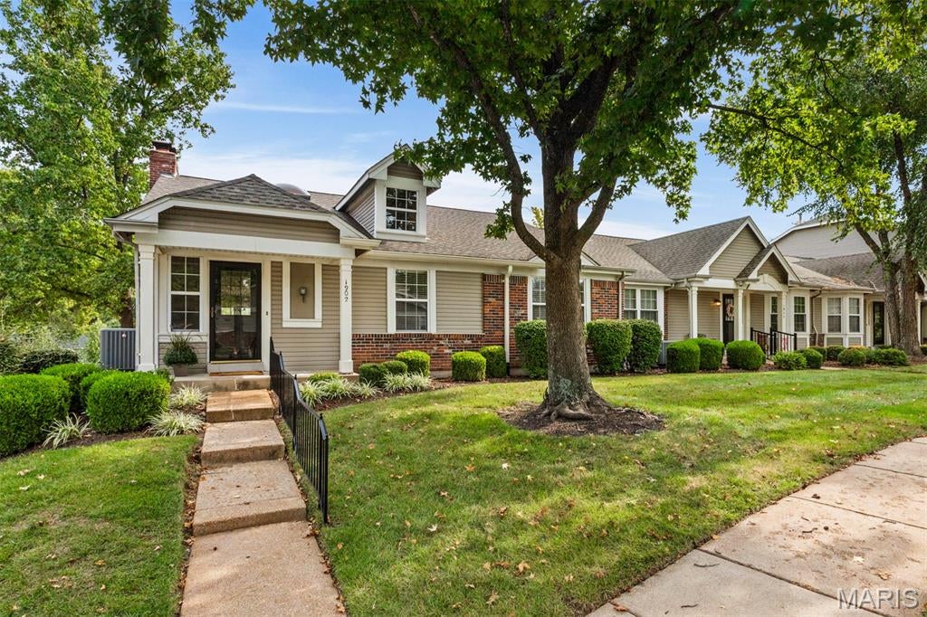 Showings will start on Friday, Sept 18th. This Beautiful and Light Filled Corner Unit & Ranch Style Condo/Villa is located in the popular Villages at Baxter Ridge! Meticulously maintained by the second owner, this home Features an Open Floor Plan, Large Wood Entry Way, Great Room with Cathedral Ceilings, Skylights & Gas Fireplace, Large Primary Bedroom ensuite with an updated shower & vanity, double sinks & Large Walk-In Closet professionally organized by a closet company, Main Floor Laundry Room, Nice size 2nd Bedroom and a Front Room that could be used as an Office, Playroom/TV Room or a 3rd Bedroom. There is also a Second Full Bath on the Main Level. The Eat-In Kitchen is updated with Soft Close Custom Cabinets, Granite Counters, Wood Flooring and SS Appliances! The Unfinished Walk-Out Lower Level has a rough-in for future finishes! It also features a outside patio area! On this level is a oversized 2 Car Garage! Additionally, on the main level there is a Large Deck that will be replaced by the Association. Seller has already paid the assessment for the deck replacement! Once replaced, this will be a Fabulous area for Relaxing and Entertaining. Because this unit is located on a corner, there is an additional Wall of Windows and Tons of Privacy too! This Highly Desirable Floor Plan is located in a Great Neighborhood that offers a Subdivision Clubhouse, Pool, Tennis Courts and Basketball. Use of these amenities are included in the annual fee! This Chesterfield Villa is close to Shopping, Restaurants, Entertainment, Parks, Schools, etc! Easy Highway Access makes this Villa and location ideal! This home is a gem!!!