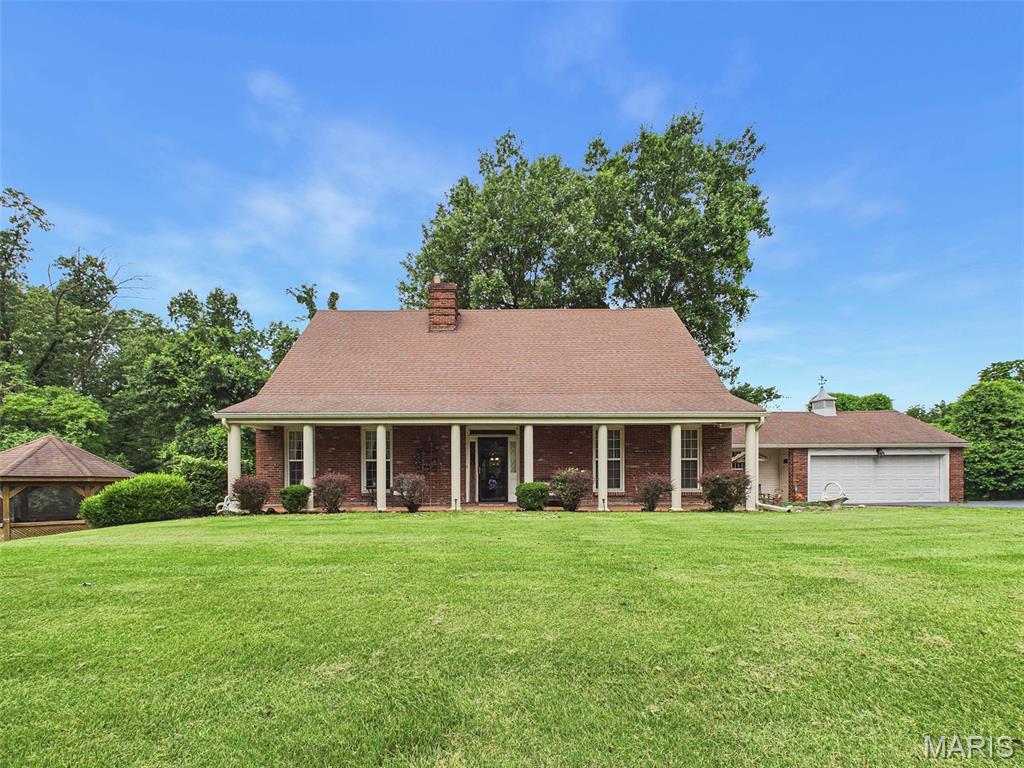 Tucked away on a quiet cul-de-sac, backing up to the Nature Preserve,  this 5-bedroom, 4-bath home offers exceptional privacy, generous living space, and nice features both inside and out. The impressive foyer with wonderful brick flooring opens to  a spacious living room featuring a fireplace. The formal dining room is highlighted by a bay window, creating the perfect setting for entertaining. The eat-in kitchen flows seamlessly into the family room, that opens to a deck overlooking the private backyard and an inground pool. The main level also features a dedicated home office with custom built-in bookcase and a full bath, making it ideal for working from home or accommodating guests. Upstairs, the spacious primary suite offers a private bath and lots of closet space. Three additional generously sized bedrooms feature  hardwood floors and ample storage. A hall bath completes the upstairs. The finished walkout lower level provides even more living space with a large L-shaped family room with fireplace, a fifth bedroom, and a full bath. Outside, you have an inground pool, a screened gazebo and mature landscaping that enhances the home's peaceful setting. Completing the property is a convenient two-car attached garage. This home combines space, comfort, and privacy in a sought-after cul-de-sac location.