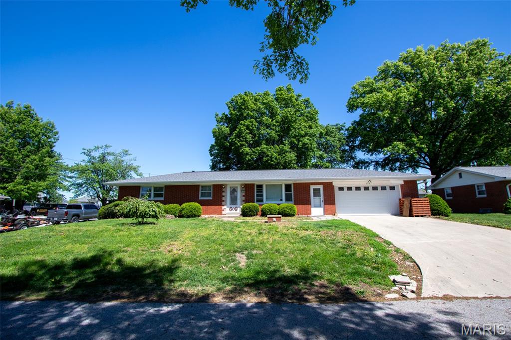 Opportunity Knocks in Waterloo!

Welcome to this solid 3-bedroom brick ranch with an attached garage is full of potential and ready for its next chapter. Being sold as-is, this home is perfect for buyers looking to add their personal touch and build equity.

Inside, you’ll find hardwood floors in all three bedrooms, while the living room has already had the carpet removed—giving you a clean slate to design the flooring of your choice. The layout offers a functional flow with great bones, making it an ideal candidate for updates and customization.

The full basement adds even more value, featuring 2 bonus rooms, and a huge family room that could easily be transformed into a spacious home theater, game room, or additional family living space.

Whether you’re an investor or a homeowner with vision, this property offers a fantastic opportunity to create something special. With its desirable location in Waterloo and strong structural foundation, this home is ready to be brought back to life.

Bring your ideas and make this one your own!