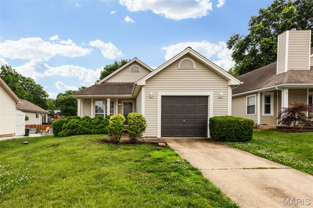 OPEN HOUSE SUNDAY 6/14 1-3!! 
Check out this surprisingly spacious ranch offering the total package of single story living with extra space downstairs for kids or guests, all within walking distance to Frances Howell elementary and middle schools.  Hosting 2 PLUS bedrooms, 2 full baths with attached garage, fully fenced yard and a dry, finished basement, this sunny, open plan invites from the moment you walk in. The kitchen offers brand new stainless appliances and overlooks a comfortable dining/living room with vaulted ceilings and an exterior glass door leading directly off the living area to the back yard. Tucked privately to the side are two generous bedrooms and a large bath with combined tub and shower. Downstairs discover a bonus room large enough for work or play, plus a large extra sleeping room and second full bath with walk-in shower. The gracious and fully fenced yard includes a comfortable, level patio for the grill, but leaves sun and green space for the garden and play. The attached off-street garage is an absolute cherry on top. Fresh paint and carpet, newer HVAC, and spotless kitchen appliances make this a low-maintenance home, so call your agent for a chance to see it today!!
