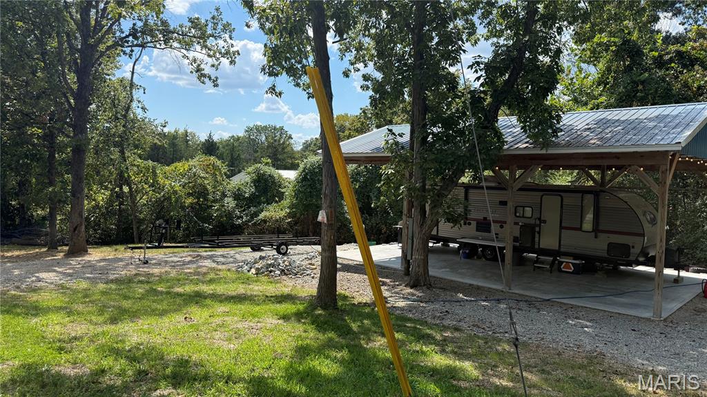 Who’s ready for the perfect weekend getaway or build your perfect lake home? Just 40 minutes south of St. Louis, Goose Creek Lake Community is where weekend adventures turn into lifelong family memories! This corner lot is flat, convenient, and ready to enjoy. Featuring 200-amp electric service, a 1,500-gallon holding tank, and a well that’s only one year old. A 24 x 36 concrete pad with plumbing already installed makes this property ready for your next plans.

And there’s MORE! Included with the property is a gorgeous 2019 Grey Wolf camper featuring one bedroom, two bunk beds, a full bath, electric fireplace, oven, refrigerator, and beautiful interior finishes. There’s also a 30-foot culvert, plenty of parking, and a covered concrete pad—everything you need to start enjoying lake life right away!

Goose Creek is a gated lake community offering approximately 400 acres of boating, fishing, swimming, beach access, boat ramps, a pool, parks, and three additional fishing ponds. 

Why wait? Summer isn’t over yet—and at this price point, this one won’t last! Pack the family, bring the boat, and come enjoy your own little piece of the lake. Who’s ready? I know you are!