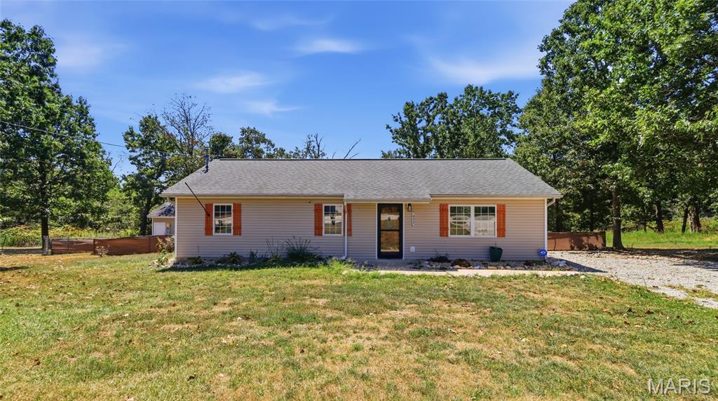 Welcome to the perfect blend of peaceful country living and everyday convenience in St. Robert! Nestled in a quiet neighborhood on an impressive 5-acre lot, this well-maintained 3-bedroom, 2-bathroom home offers plenty of space to spread out while keeping you just minutes from Fort Leonard Wood, shopping, dining, and local amenities.

Step inside to a comfortable, inviting interior featuring new flooring throughout and a variety of thoughtful updates completed since 2023. The kitchen has been refreshed with updated countertops and appliances, creating a functional space ready for everything from quick weekday meals to weekend gatherings. Updated ceiling fans and light fixtures add a fresh touch throughout the home, while a newer water heater provides another valuable improvement for the next owner.

Outside, the expansive 5-acre property is where this home truly stands out. Whether you've been dreaming of extra room for outdoor activities, gardening, entertaining, pets, or simply enjoying more privacy and open space, this property gives you the flexibility to make it your own. Relax and enjoy the quieter setting without giving up quick access to everything St. Robert has to offer.

With its combination of acreage, recent updates, and a convenient location just minutes from the Fort Leonard Wood main gate, this home is ready for its next chapter. Schedule your private showing today and come see everything this St. Robert property has to offer!