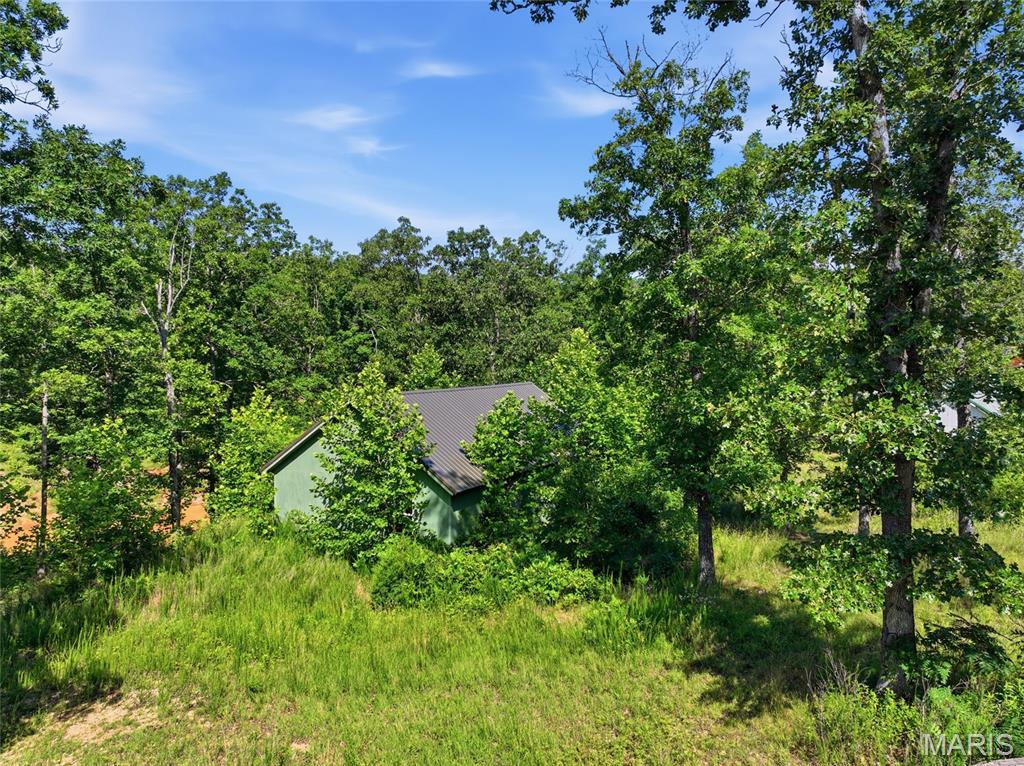 Tucked away in the heart of Missouri's outdoor paradise, this unique Steelville property offers an opportunity to create your own retreat in one of the state's most sought-after recreational destinations. Situated on a half-acre lot, this 1-bedroom, 1-bath unfinished home is ready for your vision and creativity to bring it to life. Imagine spending your days exploring the natural beauty that surrounds you. Located near several state parks, the scenic Meramec River, the Ozark National Scenic Riverways, and the vast Mark Twain National Forest, this property places endless outdoor adventure right at your doorstep. Whether you enjoy kayaking crystal-clear rivers, camping under the stars, hiking wooded trails, fishing, or simply escaping the hustle and bustle of city life, you'll find no shortage of ways to enjoy the Ozarks lifestyle. The unfinished home provides a blank canvas for a weekend getaway, investment opportunity, hunting cabin, or future full-time residence. With plenty of room on the lot for outdoor living, equipment storage, or additional improvements, the possibilities are wide open. Being sold as-is, this property offers a chance to invest in a location where nature, recreation, and small-town charm come together. If you've been searching for an affordable opportunity near some of Missouri's best outdoor attractions, this is one you won't want to miss. Schedule your showing today and start imagining the possibilities!