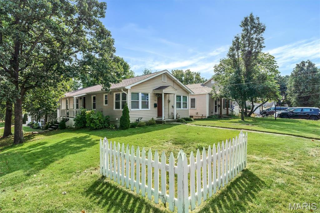 Classic Kirkwood charm meets thoughtful single-story living at 836 Evans Avenue. This standout ranch welcomes you with a distinctive double-entrance layout, setting a warm, hospitable tone from the moment you arrive.

Inside, gleaming hardwood floors and expansive windows flood the interior with natural light. The heart of the home features a comfortable central living room, complemented by an updated kitchen and sunny breakfast room. Guests will naturally gravitate toward the welcoming, cottage-style kitchen entrance—a space intentionally designed for gathering, lingering, and feeling right at home. Across the back of the house, a second spacious family room stretches out, offering a bright, airy retreat for everyday lounging and entertaining.

The versatile bedroom wing offers space to adapt to your lifestyle:

Primary Suite: Features an ensuite bath with a generous footprint, giving you ample room and layout potential to create your dream private spa.

Secondary Bedroom: Well-proportioned and located near a full central bath.

Third Bedroom / Flexible Office: Currently accented with elegant glass French doors, making it ideal as a quiet work-from-home study, creative studio, or dedicated guest room.

Down below, the oversized garage provides rare ease with tuck-under storage options to keep vehicles and garden equipment organized. In addition the full basement provides even more storage.

Tucked into one of Kirkwood’s most sought-after neighborhoods with top-rated schools, parks, and downtown Kirkwood dining just minutes away, this home delivers the unbeatable formula: unmatched location, enduring character, and incredible potential.

Home to be sold as is, price reflects small projects that someone can come in and put their touch and style to make this a stellar investment.