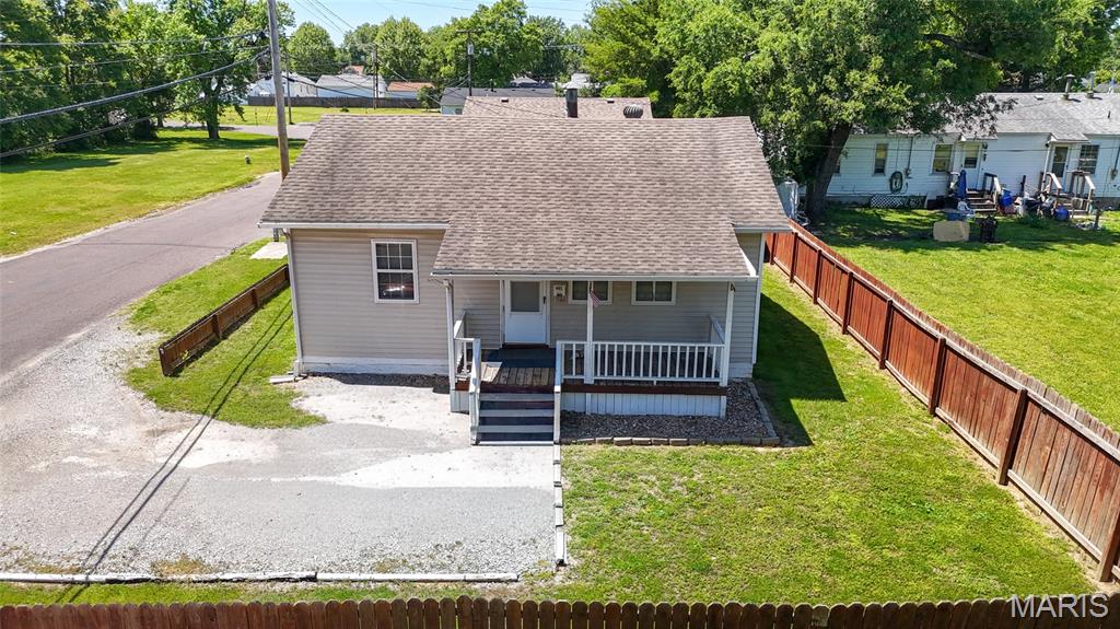 Welcome to this well-maintained 2 bedroom, 1 bathroom home in East Alton offering comfort, convenience, and affordability all in one! Architectural roof installed in 2012 by Twin-Co with Limited Lifetime Warranty Shingles. Water heater and carpet installed in 2017-both very well maintained, vinyl windows throughout, 100 amp panel with replacement of most of all the wiring to romex with ground. Also featuring main floor laundry for added ease, this home has been well cared for and is move-in ready with city occupancy inspection almost completed, allowing for immediate possession. Enjoy off-street parking, a covered front porch, partial wooden privacy fencing, and a manageable yard perfect for relaxing. Whether you are a first-time home buyer, downsizing, or looking for a ready to go investment property opportunity, this property checks all the boxes at a great price point. Schedule your private showing today while it is available.