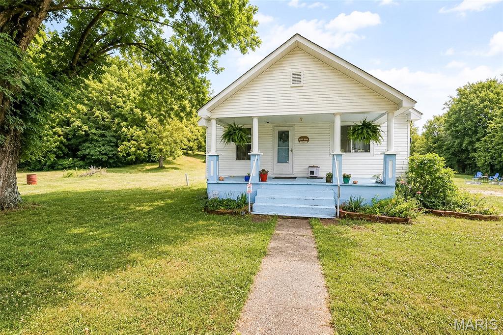 178,000 | 20972 State Highway C, Belgrade, MO 63622

Welcome to the heart of the Missouri Ozarks! Nestled on approximately 5 acres and bordering Mark Twain National Forest, this charming country home offers the privacy, outdoor recreation, and peaceful setting you’ve been searching for.

Originally built in 1925, this 1,064 sq. ft. home has been extensively renovated over the past several years while maintaining its character. Major improvements include a new roof, new well, updated septic system, new electrical wiring, and new insulation, providing peace of mind for years to come. A full unfinished basement offers excellent storage.
Enjoy direct access to thousands of acres of public land, making this an exceptional location for hunting, hiking, wildlife watching, horseback riding, ATV adventures, and exploring the Ozarks. 
Whether you’re looking for a full-time residence, weekend retreat, hunting cabin, Airbnb investment, or your own slice of country paradise, this property offers possibilities. Just minutes from Council Bluff Lake, Caledonia, Missouri for boating, swimming, fishing, kayaking, camping and a 12 mile lakeside trail! This home is located in the scenic Belgrade, Missouri surrounded by the Ozark Mountains. 
Simply put, quiet country living with updates and improvements for your peace of mind with unmatched access to Missouri’s great outdoors, this one deserves a look!