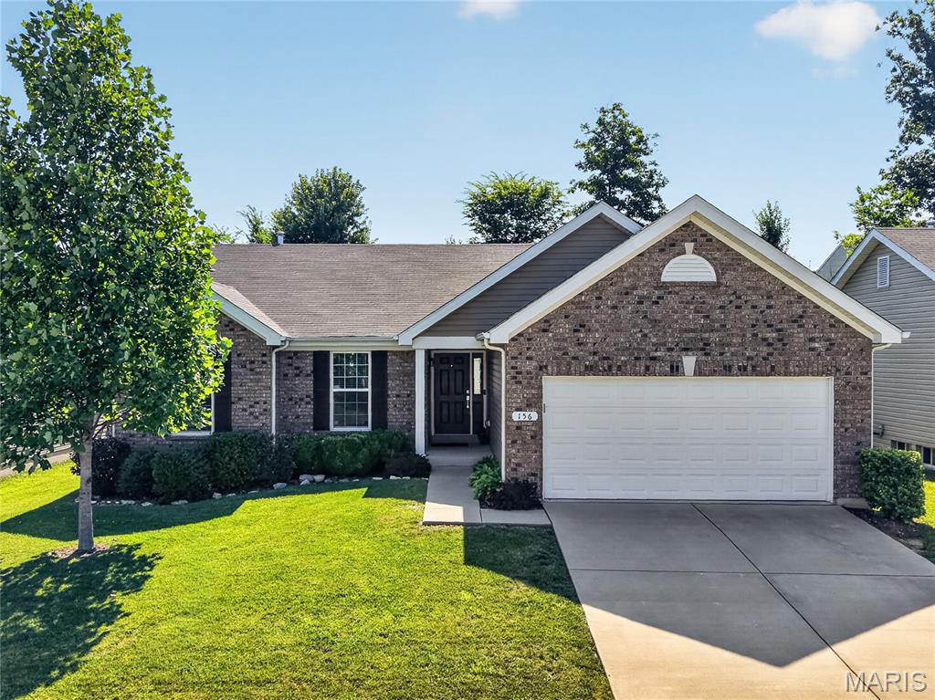 A TRUE MUST SEE! TONS OF NEW UPGRADES completed in the last year! Fall in LOVE with the FRESH FEEL of this 8 year NEW 3 Bedroom, 2 Bath Ranch with 2 Car Garage in desirable Wyndstone BACKING TO TREES! The OPEN Hickory FLOORPLAN offers 1,571 sq ft ft with SOARING Vaulted Ceilings! NEW Luxury Wide-Plank Flooring throughout the Main Level. Get ready to Enjoy the Covered Front Porch! Great Room with Half Wall & Built-In Bookcase to Lower Level! DELUXE Kitchen features Maple Wood Cabinets, Under Cabinet Lighting, NEW Quartzite Counters with converted Counter Seating, NEW Quartzite & Designer Tile Backsplash, NEW Custom Island, Walk-In & Utility Pantries, Stainless Appliances- NEW 5-Burner GAS Range & French Door Refrigerator stays! Dining Room with Slider to the LEVEL Partially Fenced Backyard & TREES with SHADE! Owners Suite features a HUGE Walk-In Closet & Designer Bath w/ Tall Wood Vanity, Linen Closet, Comfort Soaking Tub with Open Shelving & Shower w/ Rain Head, Corner Shelves & Glass Door. SPACIOUS Bedrooms #2 & #3 with Full View Windows share Hall Full Bath with Tall Wood Vanity. Main Floor Laundry with Wall Cabinets & Coat Closet- Washer/Dryer stays! NEW Hardwood Stairs leads to the Lower Level that is Ready to Finish with Egress Window, Hobby Sink & Rough In Plumbing! NEW Lights & Fans! Fresh Paint- 2025! Located in Wentzville Schools: Duello Elementary, South Middle & Timberland High School. Enjoy Wyndstone’s Deer Ridge Park Trailhead & this Walkable Neighborhood! A MUST SEE to EXPERIENCE!