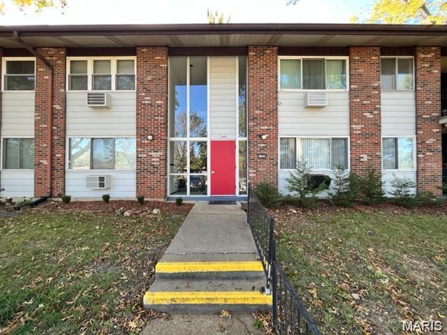 Charming ground-level condo with numerous recent updates! The kitchen features granite countertops, stainless steel microwave and refrigerator, updated white shaker-style cabinetry, a custom backsplash, a deep stainless steel sink, and new flooring. The entire unit has fresh paint and updated flooring throughout. Newer A/C units ensure comfort year-round. Enjoy two separate walkouts to a covered, private patio. Spacious rooms and large closets provide ample storage, while the master bedroom includes its own patio access. Conveniently located just steps from the laundry room, with one assigned parking spot and nearby guest parking. Minutes from shopping, dining, recreation, and easy access to Highways 270, I-170, and I-70. Currently tenant occupied.  Seller owns six units in this complex and is willing to sell all 6 as a package.
