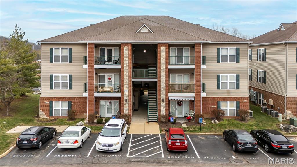 Welcome to this beautifully updated main-floor condo in the heart of Valley Park! Featuring 9' ceilings and an open, airy layout, this main floor condo offers exceptional comfort and style. The kitchen boasts granite countertops, ample cabinetry, and a great connection to the main living space - perfect for everyday living and entertaining. Enjoy fresh updates throughout, including new flooring in both bathrooms and the laundry room, plus a new shower surround and fixtures in the primary bath. All bedrooms feature custom closet organizers, maximizing storage and functionality. Additional locked storage located on the porch as well. With a prime location close to parks, shopping, and restaurants, this move-in-ready condo is the ideal blend of comfort and convenience. Don't miss it!