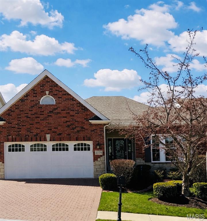 Beautifully maintained 2-bedroom villa with private office (could be 3rd bedroom with an added closet) in desirable St. Charles. This spacious home offers 2 full baths and 1 half bath with an open floor plan ideal for comfortable living and entertaining. The vaulted great room features a floor-to-ceiling stone gas fireplace and large windows for abundant natural light. The kitchen offers 42” cabinets with crown molding, granite countertops, stainless steel appliances, walk-in pantry, built-in desk, and a large center island. Hardwood flooring, recessed lighting, and a breakfast room that leads to the screened-in porch. The primary suite includes a tray ceiling, remote-control blinds, double sinks, separate shower and jacuzzi tub, and walk-in closet. The office features custom built-ins and French doors. Formal dining room includes wainscoting and crown molding. The finished walk-out lower level with sliding glass door offers a second gas fireplace, wet bar, spacious family room, second bedroom, full bath, and large storage room. Recent updates include new triple-pane windows (2025) and water heater. Additional features include permanent backup generator system and a safe.