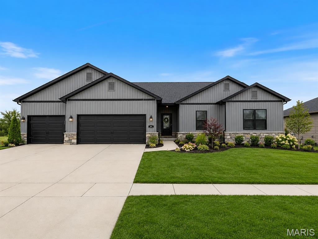 Better Than New! Why wait months for new construction and spend thousands on upgrades? This beautifully upgraded ranch offers all the extras buyers want and more. Enjoy energy-efficient living with solar panels and an EV charging station, while taking in breathtaking sunset views over the open field behind the home. Outdoor living is enhanced by a screened-in deck with sun shades, irrigation system, vinyl privacy fencing, and professionally upgraded landscaping.

Inside, you'll find a stunning kitchen featuring quartz countertops, an oversized island, custom soft-close cabinetry, stainless steel appliances, and premium finishes throughout. The spacious primary suite includes a walk-in shower with rain shower heads, dual vanities, and a large custom closet.

The finished lower level provides additional living space with a large recreation area, surround sound system, bedroom, full bath, and two generous storage rooms. Additional upgrades include a reverse osmosis system, water softener,  radon mitigation system, coffered ceilings, and laundry room sink.

Move right in and enjoy the luxury, efficiency, and convenience this exceptional home offers.