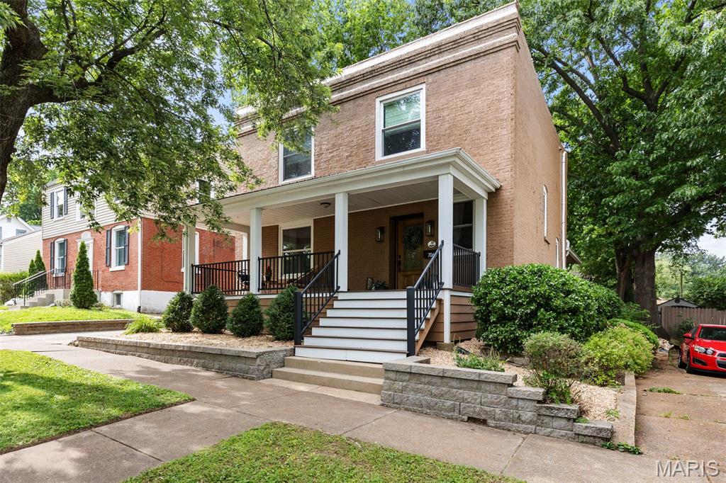 A century home in the city isn't rare these days, but a century home with these kinds of modern amenities and high quality craftsmanship is. This 2-story brick beauty shows off with new guts (furnace, A/C, and water heater), new microwave and wine fridge, new built-in closet, remodeled main floor bathroom in '21, living room built-ins, and exterior tuckpointing. That exterior boasts one of the nicest 1,000 SF finished garages and workshops in the whole city and that's no hyperbole. You'll have to see it in person. The paver drive and patio bring character to the property and act as a great hosting space. With character, ample living space, and quality finishes everywhere, this property is sure to check those boxes. Schedule your showing today!
