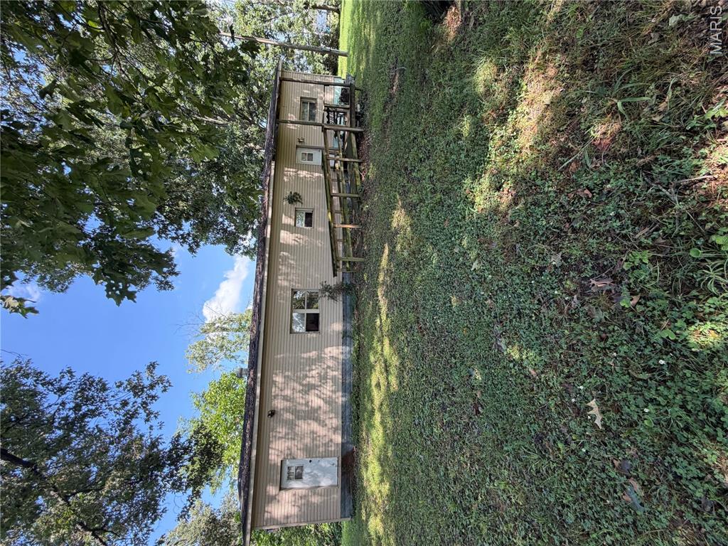 Opportunity awaits with this 3 bedroom, 2 bath home offering approximately 1375+/- sqft of living space on a spacious triple lot totaling 0.46+/- acres. Featuring a mobile home with an addition, this property also includes an additional bonus room that could be used as a home office, playroom, or extra sleeping area. A storage shed provides extra space for tools and equipment. With plenty of potential, this fixer upper is ready for your vision- whether you're looking for an investment property, rental opportunity, or a place to make your own. Bring your ideas and unlock the possibilities!