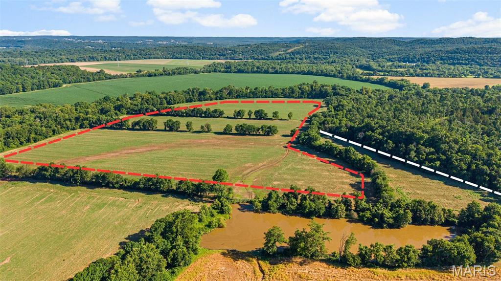 Farmland! 59 Acres Along the Big River — Where Income, Recreation, and Wide-Open Possibility Meet

Looking for land that can work for you and still give you a place to breathe? This 59-acre tract offers a rare combination of productive farmland, recreational potential, and Big River scenery.

Set in the Byrnes Mill/Eureka area of Jefferson County, this property offers that hard-to-find blend of rural privacy and convenient reach. The surrounding Big River Valley is known for its wooded hillsides, open ground, river bottoms, and outdoor lifestyle feel — giving this land a setting that feels removed from the noise, yet still within practical access to Eureka, Fenton, High Ridge, and the greater St. Louis region

Currently leased to a farmer, the property provides an existing agricultural use while preserving future flexibility for the next owner. Whether you’re looking for land to farm, a weekend recreational escape, or simply a long-term hold with natural beauty, this property offers a compelling opportunity.
 59  acres. Big River setting. Income potential already in place. This is not just land — it’s income, recreation, and freedom in one property. It has a road easement that connects to Brynes mill Rd

Running along the Big River, this acreage delivers the kind of setting land buyers are always searching for: open ground, river proximity, privacy, and room to enjoy the outdoors.

Use it. Lease it. Explore it. Hold it.
Land like this is getting harder to find.