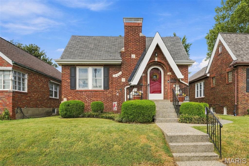 This charming South St. Louis home checks all the boxes-pristine curb appeal, incredible character, move-in readiness, and a fantastic location just a few doors down from Trattoria Marcella and some of the best restaurants and shops the area has to offer! In the Lindenwood Park neighborhood, this is the kind of home that makes you say, “This is it!” From the moment you arrive, the curb appeal delivers. The landscaped front yard and the sidewalk and front porch feature a distinctive epoxy stone finish that gives the entry an elevated, polished look. Inside, the front living room steals the show with dramatic vaulted beam ceilings, original wood floors, windows galore, and a cozy gas fireplace. The open flow into the dining room creates a spacious vibe that’s perfect for hanging out, hosting friends, or simply enjoying everyday life. Freshly and professionally painted throughout, this home is ready for its next chapter. Two spacious main-level bedrooms, plus a refreshed bath with a new vanity and toilet and a beautiful stained-glass window. The eat-in kitchen is spruced up and ready to enjoy, with direct access to an incredible outdoor living space. Step onto the large deck with a built-in pergola, head down to the upscale large, poured patio, and enjoy the beautifully landscaped, level backyard and the white fence that fully encloses your outdoor space. Plenty of room for grilling, gathering, gardening, pets, play or simply soaking up your own beautiful yard! The full walkout basement is unfinished with a work bench giving you flexibility for storage, hobbies, a home gym, workshop, or future finishing potential. The location is everything! An incredible mix of restaurants, shops, parks, and neighborhood favorites that make South St. Louis living so much fun. Passed City Occupancy. 100% move-in ready. Come for the vaulted ceilings. Stay for the backyard. Fall in love with the neighborhood!