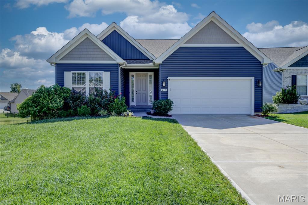 Only 4 years young and offering over 2,000 sqft of living space, this beautiful home is tucked away on a quiet cul-de-sac with a level backyard and convenient access to schools, highways, shopping, dining, and entertainment. The open-concept floor plan features 9-foot ceilings and stylish laminate flooring that flows seamlessly from the entry foyer through the living room, kitchen, and dining area. The stunning kitchen is designed for both everyday living and entertaining, showcasing quartz countertops,  42-inch custom cabinetry, a center island with breakfast bar, and ample storage. The dining area is filled with natural light from the large windows overlooking the backyard.
The spacious primary suite is a private retreat with a luxury bath featuring adult-height dual vanity, walk-in shower, and large walk-in closet. Two additional bedrooms and a full bath complete the main level. The partially finished walkout lower level provides even more living space with a large recreation room, plus a framed area ready for a future 4th bedroom and rough-in for a bathroom. A generous storage room offers plenty of space for organization. Other features include Gas stove, Soft close cabinets, upgraded light fixtures and ceiling fans, recessed lights and so much more. This move-in ready home combines modern finishes, functional living spaces, and room to grow! MAKE THIS YOUR PLACE TO CALL HOME.