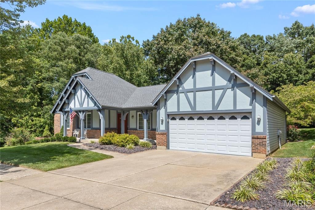 Beautiful ranch in Riverwood Estates! Sitting across from peaceful wooded area & backing to common ground this home offers a quiet setting in a convenient location. With a covered front porch and lovely deck you have your choice of areas to enjoy the beauty. As you walk in the front door you are greeted with amazing wood floors in the family room & formal dining area. The kitchen has unique custom cabinets with beautiful glass doors and a ceramic tile floor. Main floor laundry is just off kitchen & leads to garage. Primary bedroom has a gorgeous large private bath with a soaking tub and shower & walk-in closet. The other 2 bedrooms have ample space and the Family room has a gas fireplace. The lower level is breath taking with a family room, wet bar, bedroom and luxurious bath. The walk out from downstairs takes you to a private patio. Home borders on wooded area & back yard offers quiet seclusion Refrigerators, washer & dryer can stay