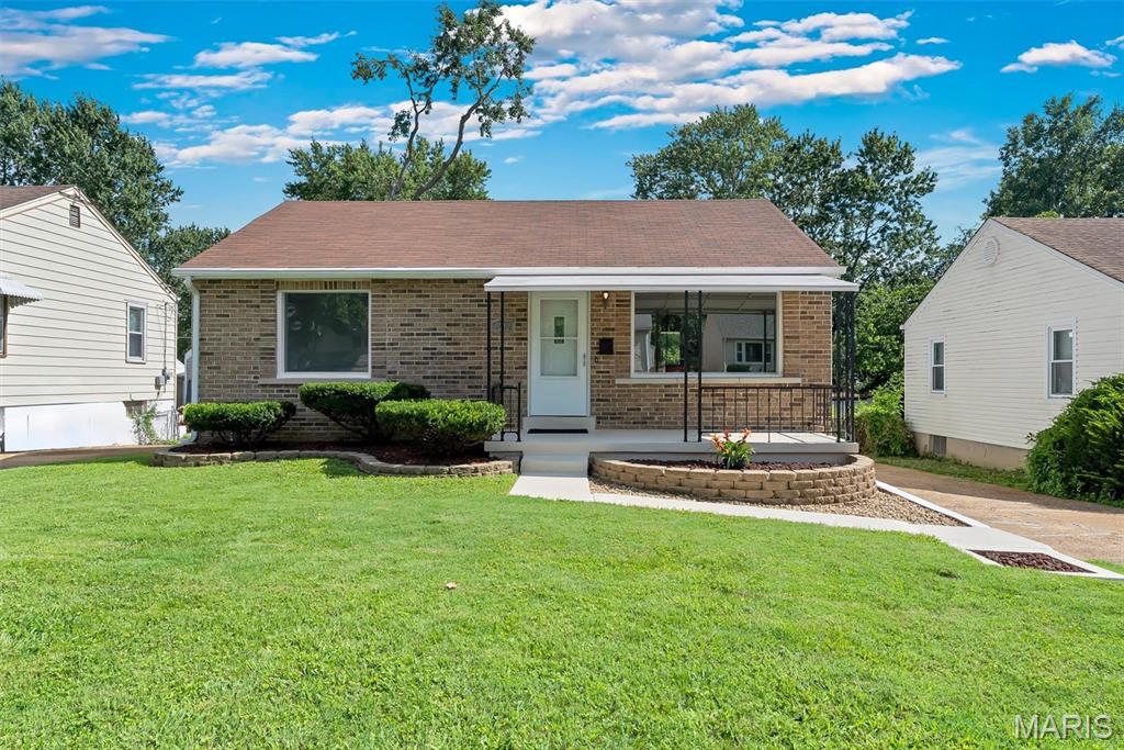 Woah! Here it is-The One! This 2-bedroom, 2 full bathroom Ranch has so much to offer for under $200K! Completely updated inside and out. All you have to do is move in! Let's talk about curb appeal. It's so fresh & clean and features landscape beds, a full brick facade, and a covered front porch. Step inside to experience the spacious living room with a really cool picture window providing tons of natural light and your daily neighborhood scenes. Every surface has been touched with paint. You'll also notice new flooring carried throughout the first floor. The eat-in kitchen offers a full complement of stainless appliances, custom cabinetry, and a designer backsplash. The first-floor bathroom services both nice sized bedrooms. It doesn't stop there. In the lower level you'll find and another full bathroom, a sleeping/bonus room, and a recreation room. How would you use these spaces? There's many ways you could go. The utility room has space for storage, a work bench for your hobbies, and a convenient walk-up exterior door. Outside, you'll find a huge fenced and flat back yard, nicely updated deck, and sweet patio for BBQ's this summer! There's also a shed for additional storage of your lawn equipment plus a fire pit for your fun gatherings. Enjoy peace of mind with a 2-year-old electrical panel and roof! All systems are performing well. With limited inventory, act fast and make it yours today!