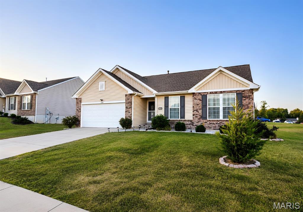 Welcome home to 146 Winter Wheat, a beautiful ranch that's 5 years new! It starts in the grand foyer with super tall ceilings, and leads into the heart of the home to the cozy living room featuring a gorgeous fireplace and mantel providing an inviting ambiance! This open plan flows seamlessly into your dream kitchen featuring a massive island to chat with family and friends over and plenty of cabinetry! Don't forget the generously sized dining room and a bonus built in desk area! 3 bedrooms and 2 full bathrooms including an amazing primary suite featuring an expansive room, double sinks with a vanity, shower and great walk in closet! The unfinished basement has 9' ceilings, an egress window for a future 4h bedroom and a rough in for a future 3rd bathroom! The cherry on the top is the flat fenced in yard on a very large corner lot, the perfect spot for outdoor shenanigans! You have to come see this in person!!