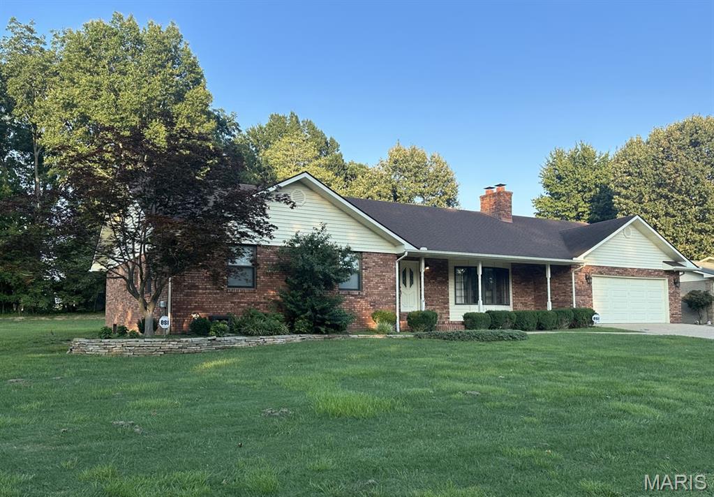 This stylish all-brick ranch is an exceptional blend of quality, comfort, and timeless design. Offering 3,774 square feet of finished living space on the main level and full basement, this home features beautiful marble, ceramic tile, parquet, and gleaming hardwood floors with no carpet anywhere. The vaulted, beamed living room showcases a fireplace with custom shelving and cabinetry, while the spacious basement great room offers a wood-burning fireplace with gas starter. Enjoy a security system, Generac generator, and two nearly new Lennox HVAC systems. The kitchen boasts granite tile countertops, abundant cabinetry with pull-out drawers, appliances, and a breakfast area. Three main-level bedrooms, formal dining, media room, office, 3.5 baths, walk-in closets, abundant storage, attached garage, large patio, and .692-acre lot near Dexter Schools complete this outstanding property. Ideal for entertaining, this move-in-ready home offers luxury, comfort, style, and exceptional value.!!!!!