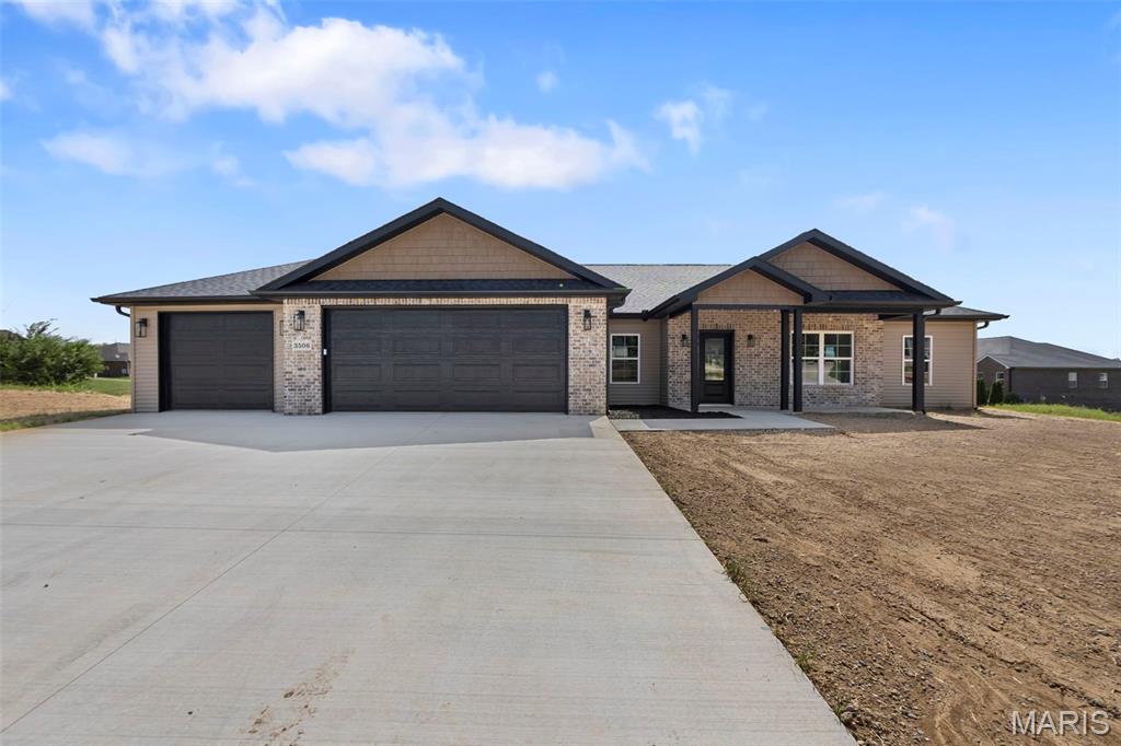 Welcome home to this beautifully built 3-bedroom, 2-bath home featuring a 3-car garage and a desirable corner lot! This quality-built home offers an inviting open floor plan with split bedrooms and 9 ft ceilings throughout. The Great Room features a cozy electric fireplace, perfect for relaxing or entertaining.

The kitchen offers beautiful stained cabinetry, quartz countertops, and plenty of space for preparing and gathering. The spacious primary suite features a custom-tiled shower and a huge walk-in closet. With quality construction, thoughtful details, and a functional layout, this home offers so much.

Call today to schedule your private showing!