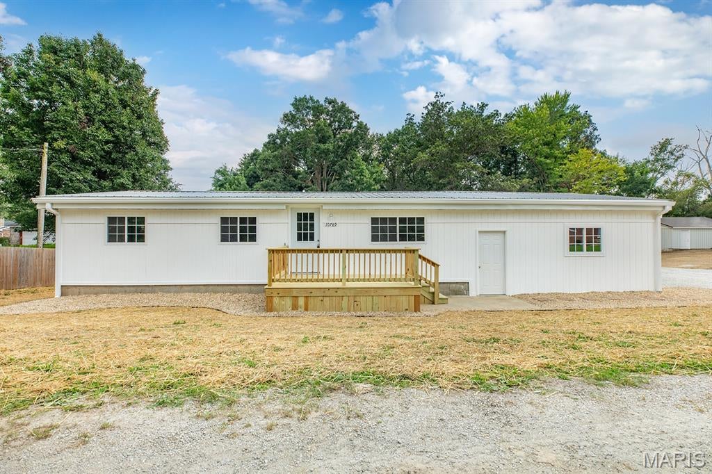Remodeled from the ground up 3 bed 2 bath home located on quiet street.  Home features 2 car attached garage, new siding, windows, roof, hvac, plumbing, insulation, wiring, flooring, trim and doors, also features 2 large decks, updated kitchen and appliances.  Set your appointment today!