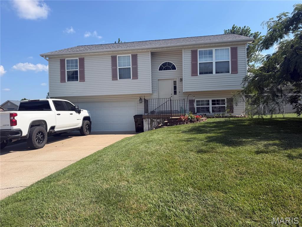 Welcome home to this beautiful split-level in Lincoln County! This move-in ready home offers 3 bedrooms, 2.5 bathrooms, and a partially finished walkout basement, providing plenty of space for living and entertaining.

Enjoy the many recent updates, including a newer roof, new furnace, new water heater, new HVAC heat pump system, new fence, new deck, and newer appliances. The open floor plan, hard-surface flooring, and spacious living areas create a bright, modern feel throughout. Situated on a nice corner lot, this home also features an oversized 2-car garage, combining comfort, convenience, and value.

Don’t miss this incredible opportunity to own an updated home at a great price—schedule your showing today!