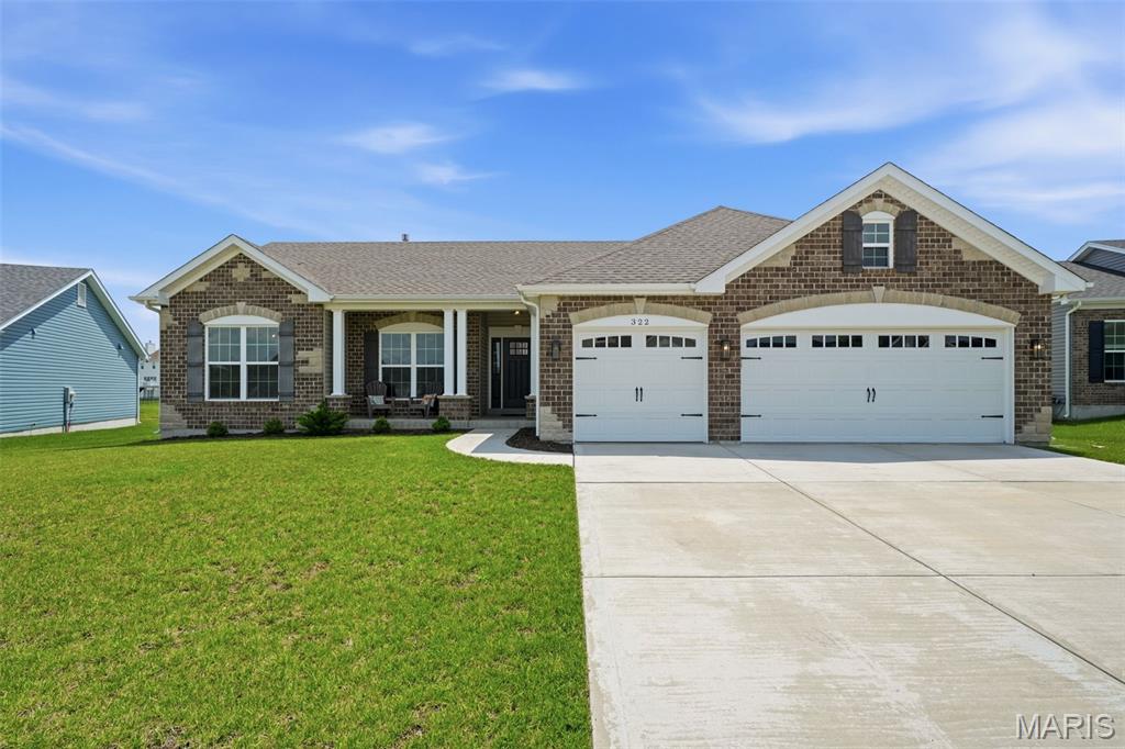 Est. 2021. Loaded with the features today’s buyers are searching for, and with a peaceful water view, this stylish ranch in St. Charles offers the perfect blend of modern comfort, low-maintenance living, and unbeatable neighborhood amenities! Located in a newer, walkable subdivision with a nearby lake, playground, and dog park, this 3 bedroom, 2 full bath home delivers approximately 1,700 square feet of thoughtfully designed main floor living. Step inside to discover luxury vinyl plank flooring installed in 2025, creating a fresh, updated feel throughout the home. The spacious open floor plan is ideal for both everyday living and entertaining, featuring a warm and inviting living room centered around a stately stone gas fireplace with a large mantel that makes a beautiful focal point. The kitchen and dining spaces flow seamlessly together, offering the perfect setup for gatherings with family and friends. The private primary suite features a built-in closet system designed for organization and convenience, while two additional bedrooms provide flexibility for guests, a home office, or growing households. With all appliances, major home systems, and the roof just 5 years old, buyers can enjoy peace of mind and truly move-in ready living. Additional thoughtful upgrades include designer lighting, elegant French doors, upgraded fireplace, and durable LVP flooring. Convenient main level laundry/mudroom with built-in cabinetry. Basement has roughed-in plumbing for a full bath and an egress window, providing endless options for finishing. The oversized 3 car attached garage offers exceptional storage space for vehicles, hobbies, and outdoor gear. Out back, relax and unwind while enjoying peaceful views of the stocked neighborhood lake right behind the home — a rare setting that adds beauty and tranquility year-round. Enjoy easy access to the neighborhood playground and dog park, creating a true community feel. Conveniently located with quick access to Hwy 370 and just a short drive from the shopping, dining, entertainment, and beloved annual events of the historic St. Charles Historic District, this home combines lifestyle, location, and modern convenience in one exceptional package!