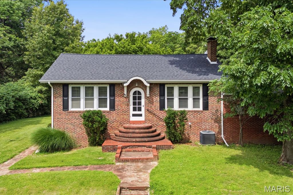 Charming all-brick home nestled on a beautiful, tree-lined lot. This move-in ready residence blends timeless character with thoughtful updates, featuring gleaming hardwood floors, abundant natural light, and freshly updated interior spaces. The spacious living room offers a cozy fireplace and large windows overlooking the mature landscape, creating a warm and inviting atmosphere. The updated kitchen features stylish tile backsplash, new LG stainless steel appliances, gas range, and ample cabinet space. A beautifully renovated bathroom showcases modern fixtures and finishes while maintaining the home’s classic appeal. Generous room sizes, fresh paint, and abundant storage add to the home’s functionality and comfort. Outside, enjoy a private setting surrounded by mature trees, attractive landscaping, and multiple outdoor spaces perfect for relaxing or entertaining. Conveniently located near shopping, dining, parks, schools, and major commuting routes, this home offers the perfect combination of charm, character, and everyday convenience.  Before making an offer on any property, buyer should independently verify all MLS data derived from various sources and not warranted accurate. 2025 taxes stated are with no exemptions.  Seller is a licensed broker.  Agents related to seller.
