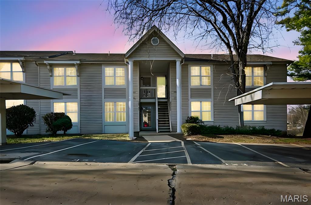 The Best Condo available is right here--  2 bed, 1 bath, upper level with balcony overseeing the backyard.  This home is freshly painted with newer thermal windows, newer sliding glass door, updated wood flooring, and a wood-burning fireplace.  This is a move-in ready home & Seller is including all kitchen appliances and the washer/dryer.  A very low monthly condo fees covers the water, sewer, & trash expenses.  This is a must see home.