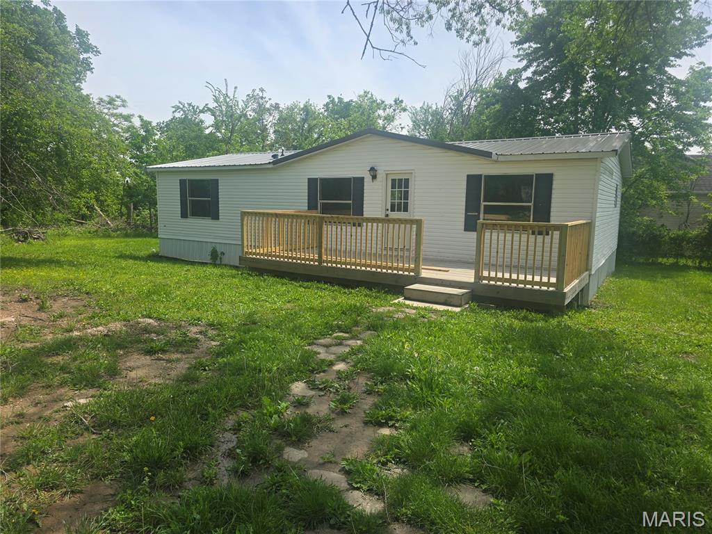 Welcome to this beautifully updated 3-bedroom, 2-bathroom mobile home that blends modern comfort with everyday convenience. Step inside to an open, inviting layout featuring durable vinyl plank flooring throughout the main living areas and plush carpeting in all bedrooms for added warmth and comfort.

The kitchen shines with brand-new stainless steel appliances, cabinets and counter tops offering a fresh and functional space perfect for cooking and entertaining. Both full bathrooms are well-appointed, providing plenty of room for busy mornings or relaxing evenings.

Outside, you’ll find a large, flat lot—a rare find that offers endless possibilities. Whether you envision a garden, play area, outdoor entertaining space, or future expansion, this yard can handle it all.

Move-in ready and thoughtfully updated, this home is an excellent opportunity for anyone seeking comfort, style, and room to grow.