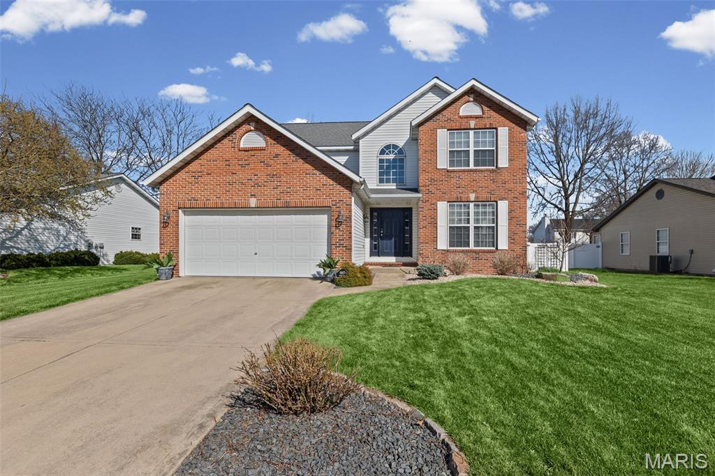 Welcome to this beautifully maintained 2-story home nestled on a quiet cul-de-sac in the desirable Hunters Pointe subdivision! Featuring stunning Brazilian Koa hardwood flooring throughout, this home offers both warmth and timeless style.

Upon entry, you’re greeted by a spacious sitting room that flows seamlessly into the dining area—perfect for entertaining. The kitchen is equipped with white cabinetry, tiled backsplash, newer stainless steel appliances, and opens to a bright breakfast room. Just off the kitchen, the inviting living room features a cozy gas fireplace and brand-new carpeting (2026). A convenient half bath and main floor laundry complete the main level. All appliances, including washer and dryer, are included.

Upstairs, the expansive primary suite offers a private sitting area and a custom walk-in closet. The fully updated primary bath boasts double vanities and a large tiled shower. Two additional bedrooms and a full bath complete the upper level, with Brazilian Koa hardwood flooring continuing throughout all bedrooms and hallways.

The unfinished lower level is already plumbed for a bathroom and ready for your finishing touches—ideal for adding additional living space. Step outside to enjoy the deck and patio overlooking a fully fenced backyard.

Major updates include: roof and fence (2018), HVAC and water heater (2016), and new living room and stair carpeting (2026).

This move-in ready home combines comfort, style, and potential—don’t miss your opportunity to make it yours!