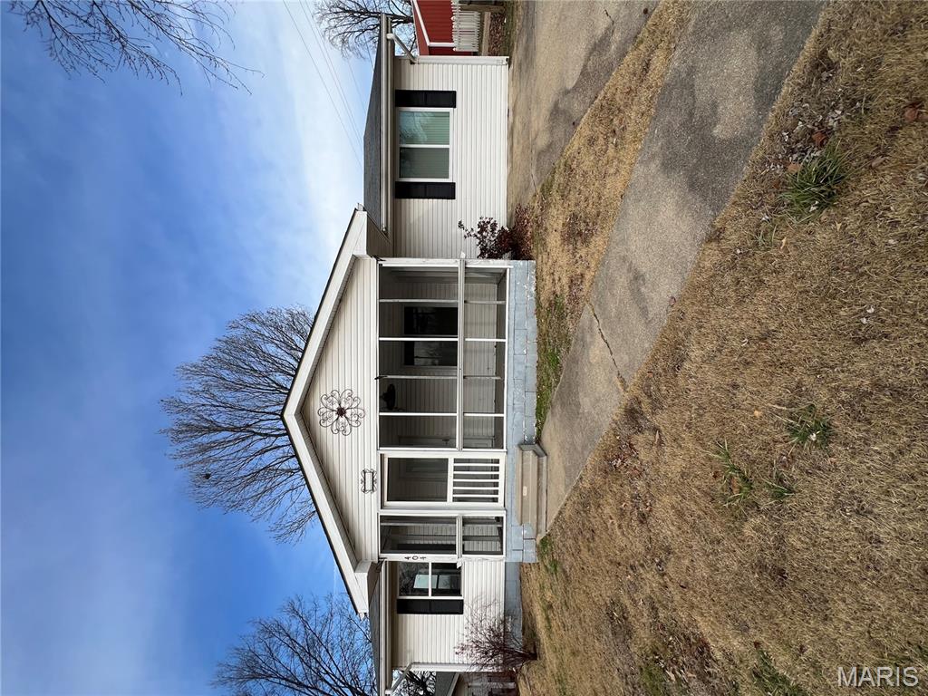 This charming 3 bedroom, 2 bathroom home is conveniently located near local public schools and features a welcoming screened-in front porch, perfect for relaxing and enjoying the outdoors. The seller is offering a $3,000 flooring allowance, giving buyers the opportunity to customize the space to their taste. The property also includes a small storage area for added convenience. With thoughtful features throughout, this home is ready for its next owner.