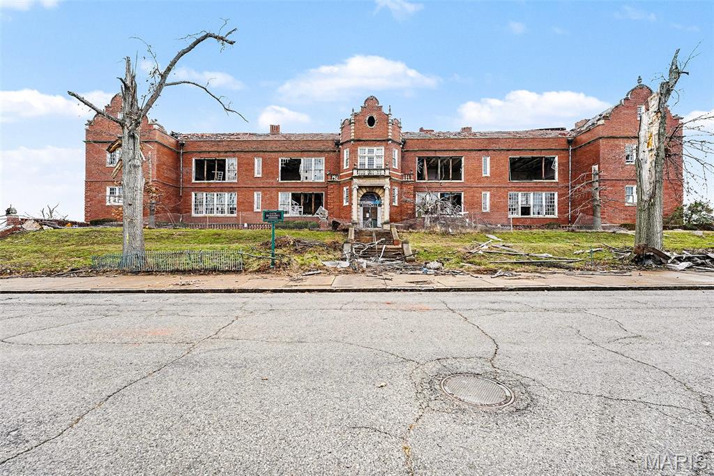 Opportunity knocks with this spacious commercial property located in St. Louis City. Formerly used as a school, this approximately 38,950 square foot brick building sits on a 2.02-acre lot and offers significant potential for redevelopment or adaptive reuse. The building sustained damage from a recent storm and is being offered in its current condition, creating a value-add opportunity for investors or owner-users.
Built in 1904, the property features a single-story layout with a flat roof and a mix of exterior wall types, providing a solid footprint for renovation. The property is zoned C and is well suited for educational, community, or commercial uses with appropriate updates and approvals. Located in the St. Louis City North submarket, the site offers convenient access to major roadways and the surrounding community. The size, layout, and zoning allow for flexibility across a range of redevelopment concepts. SLPS