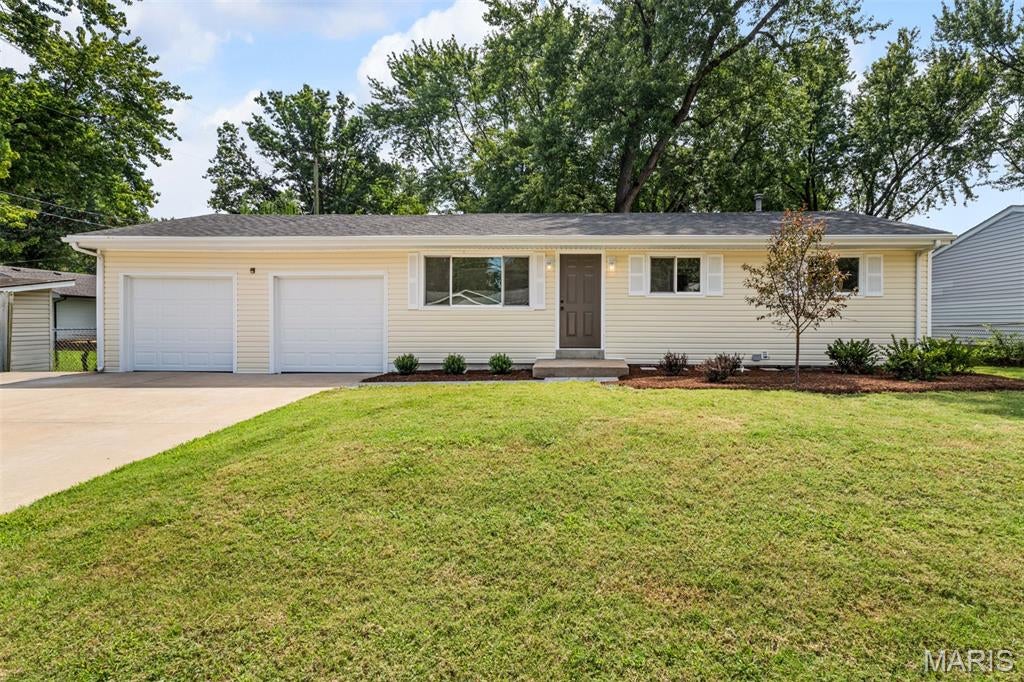 Completely Renovated Hidden Gem!

This exceptional home has been thoughtfully renovated from top to bottom, with virtually nothing left untouched. The result is a truly move-in-ready property offering the feel and finishes of a brand-new home while retaining the character and space of an established property.

The brand-new kitchen features fresh finishes and modern appeal, complemented by beautifully updated bathrooms. The entire basement has been newly finished, providing valuable additional living space for a family room, recreation area, home office, gym, or whatever fits your lifestyle.

Major mechanical updates include new electrical service and panel, new plumbing and fixtures, and all-new light fixtures throughout. The home also features all-new windows, new flooring, refinished hardwood floors on the main level, new moulding, and new six-panel doors. Fresh paint throughout completes the clean, updated look.

The oversized three-car garage with dedicated shop area is a rare find, offering plenty of room for vehicles, hobbies, storage, or projects. New garage doors and openers add even more convenience.

Outside, you'll find a huge, level, fully fenced backyard just shy of 1/3 acre, offering an abundance of space for entertaining, pets, gardening, recreation, or simply enjoying the outdoors. The newer oversized driveway provides plenty of parking, while new landscaping creates an inviting first impression.

From the major systems to the smallest finishing details, there is truly nothing that has gone untouched. This is a rare opportunity to own a comprehensively renovated home with exceptional space, updates, and functionality. A true hidden gem—come see it for yourself!