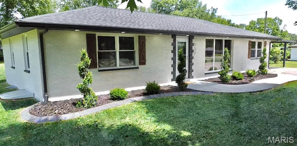 This beautifully remodeled 4-bedroom, 3-bath brick home sits on just over an acre and offers a long list of major updates, including a new roof, new HVAC system, new septic system, new water heater, and new concrete patio and sidewalk.

Inside, the fully renovated kitchen features quartz countertops, stainless steel appliances, and new soft-close cabinetry. The primary bedroom includes its own private bathroom and a spacious walk-in closet, offering a true retreat. All three full bathrooms have been completely remodeled with modern finishes. The bright living room provides abundant natural light and a new fireplace, and the home includes fully updated plumbing and electrical systems.

The professionally waterproofed lower level adds exceptional living space with a 4th bedroom with egress, a large family room, and a full bathroom—ideal for guests or multi-generational living.

Outside, enjoy the expansive yard, new patio, and a versatile outbuilding perfect for storage or a workshop. This move-in-ready home blends modern upgrades with the space and privacy you’ve been looking for. This property is agent owned!