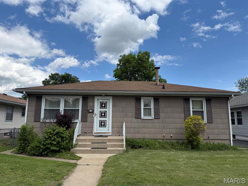 Experience a unique blend of classic charm and modern living at 743 State ST, WDRVR IL 62095. This single-family residence, built in 1958, offers a distinctive opportunity to create your ideal home. This home has been well cared for and is waiting for someone to make it their own,  The kitchen presents an inviting atmosphere with a distinctive wainscot wall  providing a unique backdrop for culinary endeavors. With three bedrooms and a well-appointed bathroom, this home is designed for practical living.  You will also find hardwood flooring in the living room and bedrooms. Outside, a private yard offers a tranquil retreat, perfect for relaxation or entertaining. An outdoor dining area and a patio extend your living space, inviting for meals and gatherings under the open sky. Discover the potential and charm of this delightful property; schedule your viewing today.