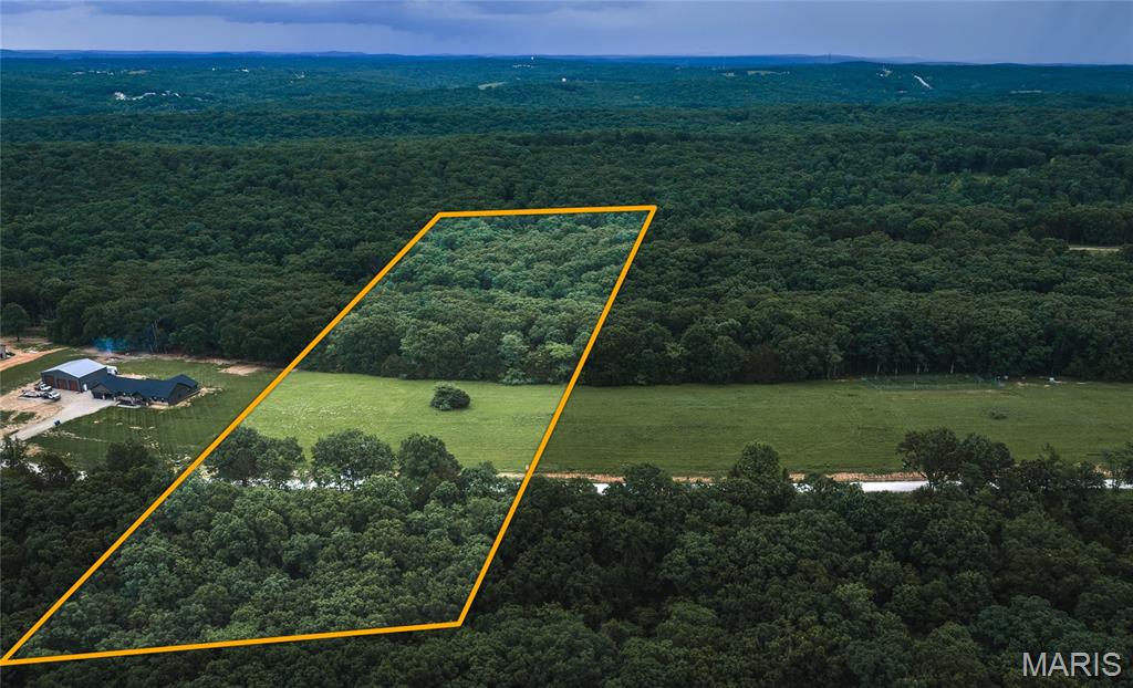 Discover the perfect blend of country living and recreational opportunity with this beautiful 10.02-acre tract located just off Hobby Farms Road. Featuring a desirable mix of open ground and hardwood timber, this property offers prime building locations and all the ingredients for your dream rural retreat. Electricity is available on site, making the property ready for your future home, barndominium, or hobby farm.

Wildlife is abundant throughout the property, providing excellent hunting opportunities right out your back door. The combination of open ground and timber creates ideal habitat for deer and turkey while also offering plenty of room for other agricultural pursuits.

Conveniently situated just 4 miles from De Soto and less than an hour from the St. Louis metro area, this tract offers the privacy and peacefulness of the countryside without sacrificing accessibility. Whether you're looking to build, hunt, start a small farm, or simply escape the city, this versatile property is ready to bring your vision to life.