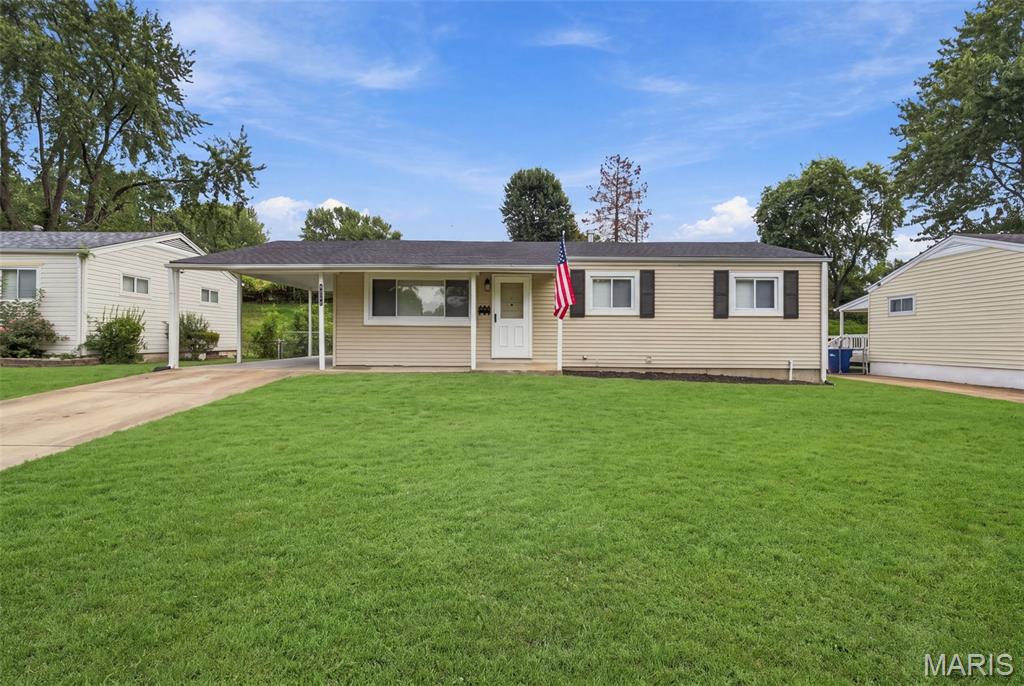Welcome home to this beautifully updated 3-bedroom, 2-bath gem in the heart of Florissant! From the moment you step inside, you'll notice the gleaming hardwood floors that flow seamlessly throughout the home — freshly refinished and ready to shine for years to come.

The heart of the home is the brand-new kitchen, thoughtfully renovated with modern finishes that make everyday cooking and entertaining a pleasure. Both bathrooms have been tastefully renovated, including a private en-suite in the master bedroom for your own personal retreat.

Enjoy the ease of covered parking with the convenient carport, and step outside to your fully fenced backyard — a perfect space for pets, play, or weekend get-togethers.

Downstairs, the unfinished basement offers a blank canvas of extra square footage — ideal for storage now, or a future rec room, home gym, or workshop down the road.

Move-in ready and thoughtfully updated, this home combines classic charm with modern comfort. Don't miss your chance to make this home yours!