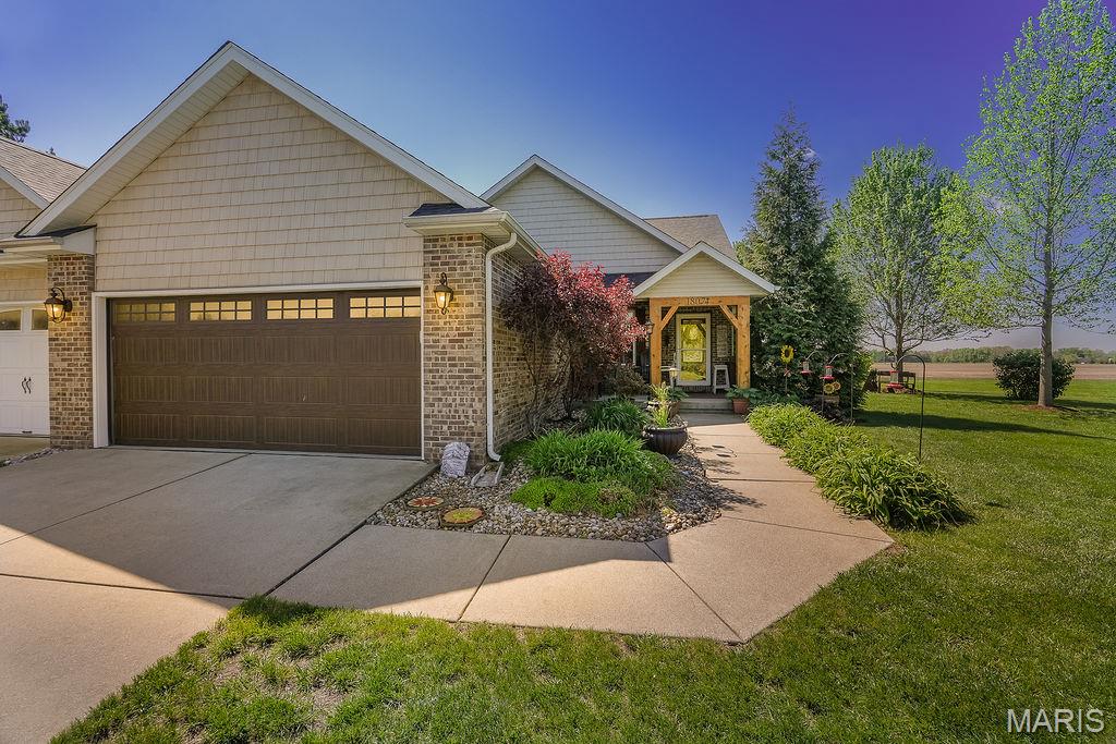 Want a gorgeous home with LOWER TAXES??  
Welcome to a truly one-of-a-kind property in Macoupin County that blends the charm of country living with the convenience of nearby major highways. Located in a gorgeous subdivision just off Renken Road, this beautifully remodeled villa offers space, comfort, and flexibility far beyond your typical villa—plus NO HOA, basically a home called a villa!
This spacious 3-bedroom, 3 full-bath home sits on an oversized lot and includes an additional lot and a brand-new shed, giving you room to expand, garden,  enjoy the outdoors, or sell off the lot if you don't need it. It is the last empty lot in this subdivision.  From the moment you step inside this home, you’ll feel the warmth of a cozy, thoughtfully updated home filled with natural light—perfect for catching stunning sunrises.
The main level features inviting living spaces, an open concept, a master bedroom/bathroom on one side of the home, and the 2nd bedroom on the other side, so you have your privacy.  All of the hallways and doorways are handicap accessible. There is abundant storage, and tasteful updates throughout. I can't forget the sunroom that will make you never want to leave this cozy space! 

Downstairs, the space keeps going and you will find a living area with a bedroom,  large family room, full bathroom, and a very large room currently used as a bedroom—ideal for guests, a home office, or multi-generational living. There’s truly more space than you’ll know what to do with.
A major bonus: this home is equipped with a whole-house generator system, ensuring you’ll never have to worry about losing power during storms—peace of mind that’s hard to put a price on.
If you’re looking for low-maintenance villa-style living without the restrictions, this home delivers—with added privacy, land, and upgrades that make it anything but typical.  Call your favorite agent today or call ME!  I would be happy to show you this upscale villa.