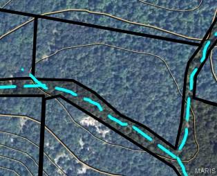 On the top of the ridge with a large amount of flat area, and a nice deeded gravel road access.
 This more than 5 acre ridgetop oasis comes with NO restrictions, and can be had for less than the price of a new truck or SUV. And has one of the best southwest facing view in the Ozarks.
Hunt, camp, build, ride ATVs on your own land, or fish or play in nearby creeks ... endless opportunities.
This property is wooded and rolling. You are within a mile of the 22,176-acre Mark Twain National Forest ... public ground where you can also hunt, ride and explore. All this, and only about 2 miles by road from U.S. 67.
Use this wooded, secluded property as a base camp for adventure or build your forever home and live out your days in secluded bliss. This and surrounding land is teeming with deer, turkey and small game, and the occasional feral hog or maybe a black bear.
There is additional acres available which adjoin this piece if interested.
