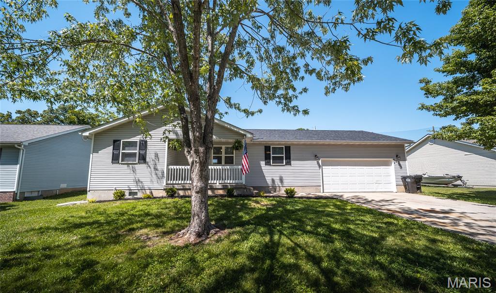 Welcome home to this beautifully updated 3 bedroom, 1.5 bath ranch in the heart of St. James, MO! Tucked away on a quiet cul-de-sac street with minimal traffic, this property offers a peaceful setting while still being close to everything the community has to offer. The home features several updates that give it a fresh, modern feel, including new flooring, new countertops, new paint and new appliances. Functional improvements have also been taken care of with a new roof and new water heater. The location truly stands out. Backing directly up to Nelson Hart Park, you can enjoy the park from your backyard and it's just a walking distance away. You’re also just minutes from downtown, where you’ll find local shops, restaurants, schools, and everyday conveniences nearby. Outside, enjoy both a covered front porch and a back porch overlooking your level backyard — perfect for relaxing mornings or peaceful evenings. An oversized 2-car attached garage adds even more functionality with extra room for storage, hobbies, or workspace. Move-in ready and full of charm, this home blends comfort, convenience, and location all in one package. Schedule your showing today!