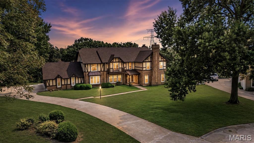 Classic English Tudor in prime location on a cul-de-sac in one of West County's most desirable neighborhoods & nestled on 1.06 park-like acres in Clarkson Valley in top rated Rockwood school district*Unique floor plan includes 4,148 sqft (not including fin LL) boasting 5 bdrms/4.5 baths & soaring ceilings in Family Rm, two spacious en-suite Primary Bdrms (one on main & one in upper) along w/2nd level loft area perfect for relaxing or reading before bedtime! One of the best features is the many rear facing wdws with wonderful view*The Fam Rm feels open & airy thanks to its 20ft ceilings & abundant wdws allowing for natural lighting*Step down to more finished living space in the walk-out lower level that includes a Fam/Rec Rm, possible bdrm/office, media/game rm & full bath & opens up to a salt water pool w/composite decking*Oversized 3 car garage *New roof & gutters in 2026*Zoned HVAC replaced in 2017*Brand new 75gal water htr*Main flr lndry includes washer/dryer*Hardwood flrs including some Brazilian hardwoods*3 fireplaces*This is an amazing home w good bones, a wonderful floor plan, soaring ceilings, open loft, windows everywhere with a great backyard view but does need tlc and your decorating touches !!