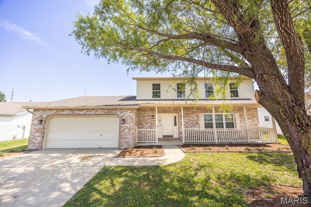 Discover turnkey comfort in this tastefully upgraded home blending contemporary style with practical living.  The bright open floor plan flows from the living room into a chef-ready kitchen with stainless steel appliances and a separate formal dining. Off your kitchen and two car garage you will find a secondary living room with fireplace for cozy entertainment .  The spacious primary suite offers a tranquil retreat with an updated ensuite. Three additional good size rooms share a modern full bath. Upgrades include new flooring, updated lighting and fixtures throughout, new siding, renovated bathrooms, cabinets, and new countertops and so much more.  Outside, a private, landscaped fenced in yard and spacious patio create an easy outdoor entertaining space. Conveniently located near schools, shopping, and highways, this home delivers style, efficiency, and location — move in and enjoy.