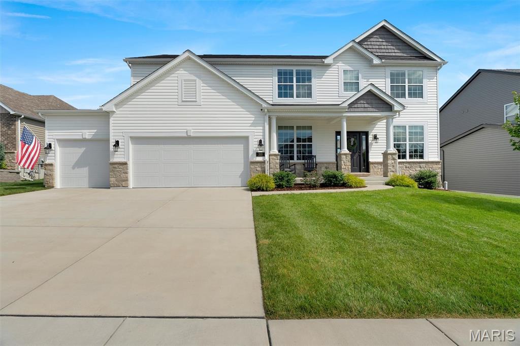Looking to build, but don’t want to wait?
Better than new and just over three years old, this stunning 4-bedroom, 3.5-bath home offers exceptional design, luxury finishes, and an impressive floor plan throughout. From the oversized 3-car garage to the beautifully landscaped yard with irrigation system and expansive patio, every detail has been thoughtfully crafted.
Step inside to discover soaring 9-foot ceilings on the main level, a breathtaking two-story great room featuring a dramatic wall of windows and a cozy gas fireplace, and an open-concept layout perfect for both everyday living and entertaining. The gourmet kitchen is truly the heart of the home, showcasing premium cabinetry, Calacatta Gold quartz countertops, a massive center island, stainless steel appliances, double ovens, a gas cooktop, and an enormous walk-in pantry.
Upstairs, the luxurious primary suite provides a private retreat with a spa-inspired bathroom and an abundance of closet space. The secondary bedrooms are equally impressive, each featuring walk-in closets. Bedrooms two and three share a convenient Jack-and-Jill bathroom, while the fourth bedroom offers its own private en-suite bath.
Additional highlights include zoned HVAC for maximum comfort, a fully sodded yard, professional landscaping, and quality craftsmanship throughout. This beautiful home combines modern elegance, functional living spaces, and premium upgrades in a truly move-in-ready package.