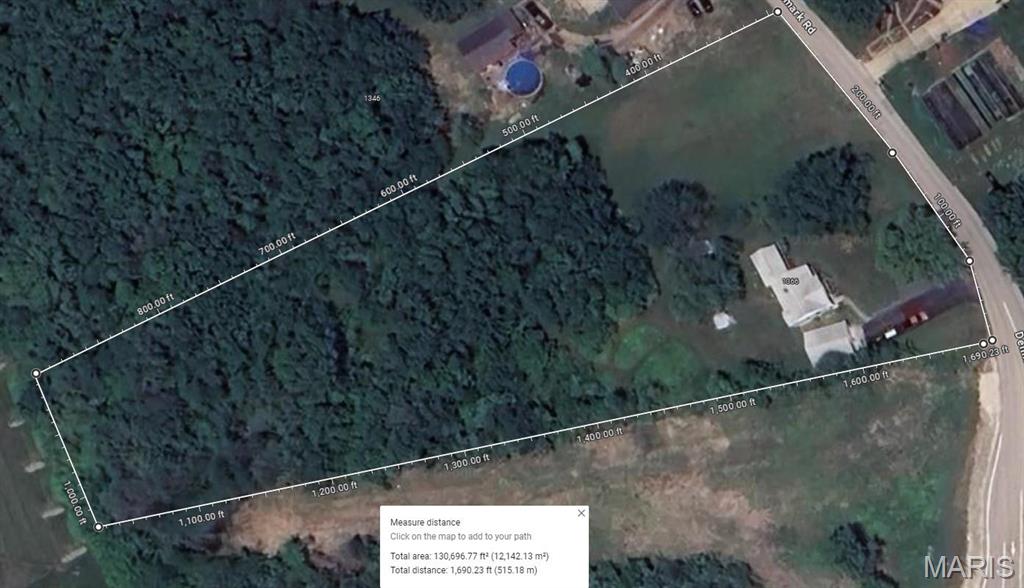 PRIME development opportunity. With 3 acres in a location where Wal-Mart, Aldis, Tractor Supply, Ace Hardware, and the list goes on and on calls home. Location is 3 miles from Interstate 44 and this stretch of Union is seeing continued growth and development. B-2 Commercial zoning allows a wide range of development opportunity. City utilities available (8 inch sewer available for tap in and a 10 inch water line) The existing home and garage are currently lived in and in good shape/property being marketed for value in land development. Location: High Traffic, Retail Center