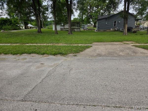Wonderful opportunity to build the home of your dreams on this vacant lot! With plenty of potential and space to bring your vision to life, this property offers the perfect setting for your future home and outdoor living ideas.